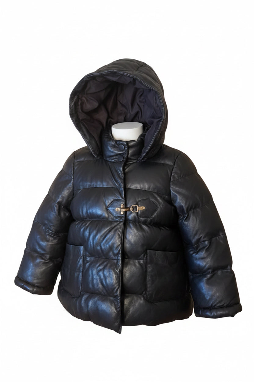 Bailey Grace Closet Concierge SMYTHE black lambskin leather puffer jacket with a hood, laid flat on a wooden floor.