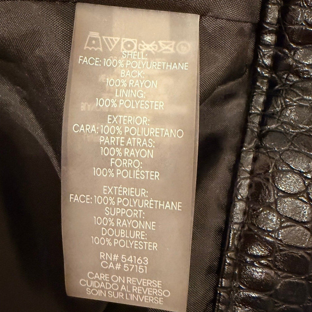 Bailey Grace Closet Concierge Calvin Klein jacket care label showing material composition in black croc-embossed faux leather