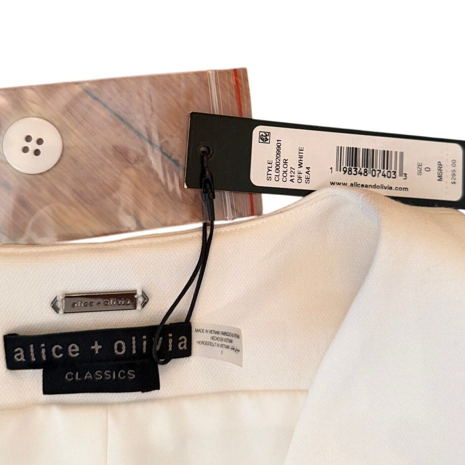 White blouse with brand tags on a white background